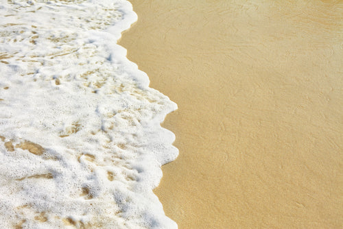 Ocean wave on the sand