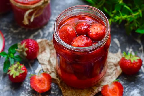 Strawberry jam in glass container